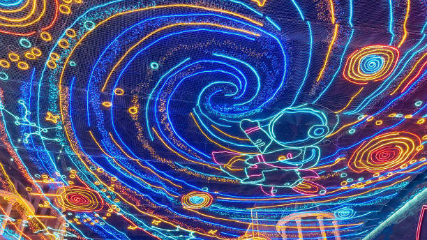 Astronaut-themed neon light decor set against a backdrop of planets and stars, evoking a vibrant and futuristic ambiance