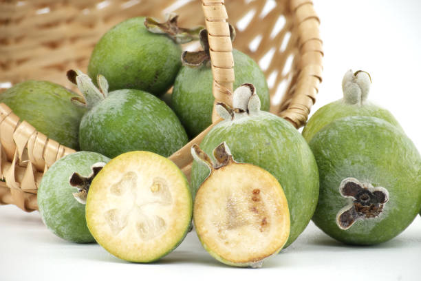 istock Fresh Feijoa Fruits Spilling from a Woven Basket 2187949970