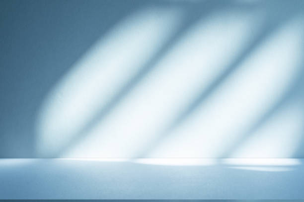istock Studio style background wall decoration presentation uses white and blue tones. with shadows cast from a nearby window, concept creating a decorative 2187956263