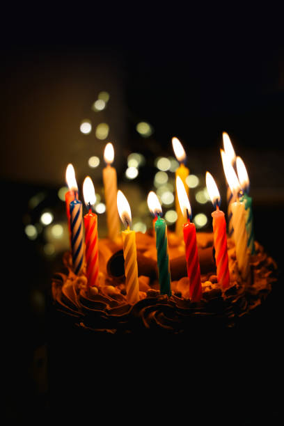 istock Chocolate cake with  colourful candles 2187956311