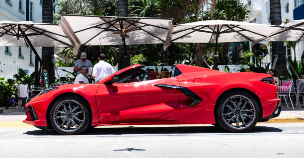Miami Beach, Florida USA - June 9, 2024: Chevy Corvette C8 3LT at ocean drive miami beach. red color Chevy Corvette 3LT. side view