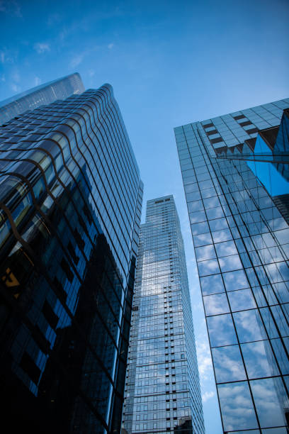 istock new york downtown architecture. perspective city skyscraper. modern skyscraper building. architectural building in metropolis. skyscraper perspective view. Urban living elevated to new levels 2187960657