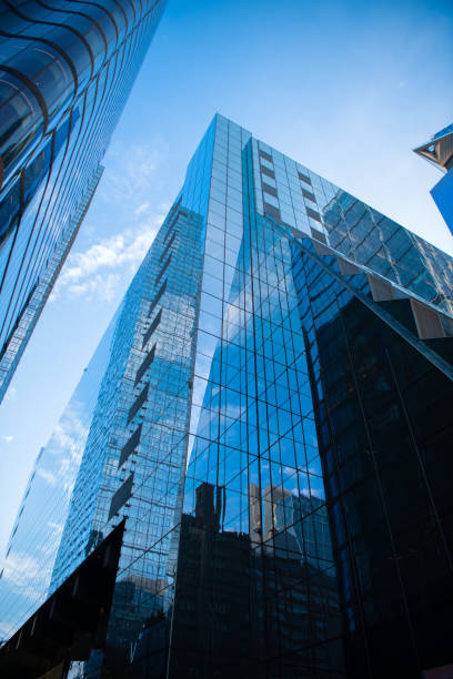 istock perspective city skyscraper. modern skyscraper building. architectural building in metropolis. skyscraper perspective view. new york downtown architecture. modern glass building 2187960684