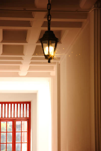 istock vintage lantern shining brightly install on retro ceiling square design perspective view 2187965047