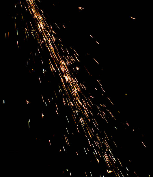 istock A black background with a lot of sparks and fire 2187966391