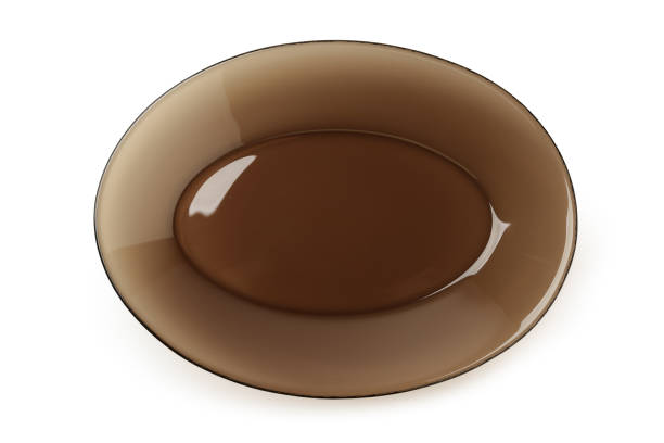 istock Brown glass plate isolated on white background 2187966541