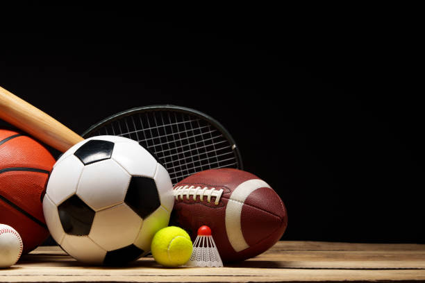 istock Various sports equipment on black background studio shot 2187966879