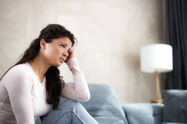istock Depressed woman feeling lonely at home. 2187969218