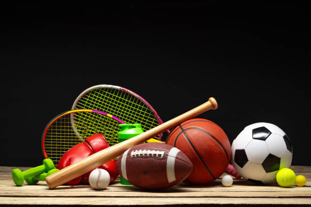 istock Various sports equipment on black background studio shot 2187971371