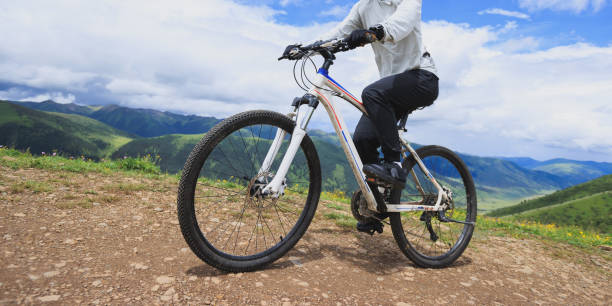 istock Riding mountain bike on grassland mountain top 2187974959
