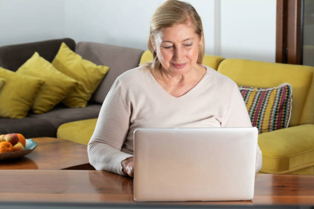 istock Woman Working on a Laptop at Home 2187976071