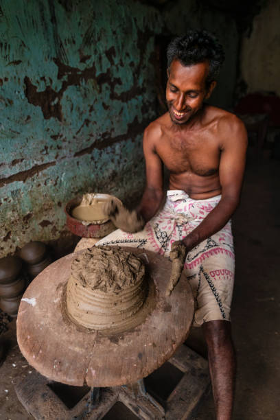 istock Lankan potter working in his workshop near Sigiriya town 2187978295