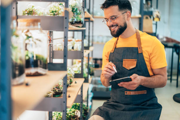 istock Handsome flower shop owner 2187979824