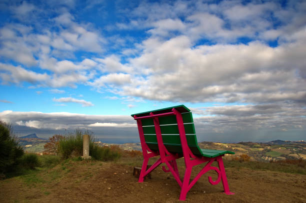 istock view of colorful bench against cloudy sky 2187981508