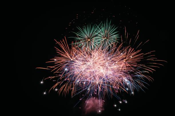 istock Vibrant fireworks against night sky 2187982213