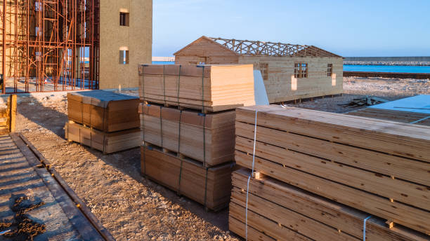 istock Lumber and Plywood Stacks at Construction Site 2187982400