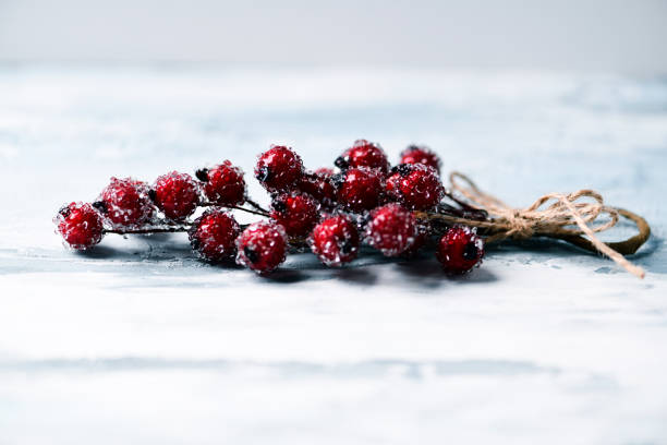 istock Christmas branch on bright background. Soft focus. Copy space 2187983326