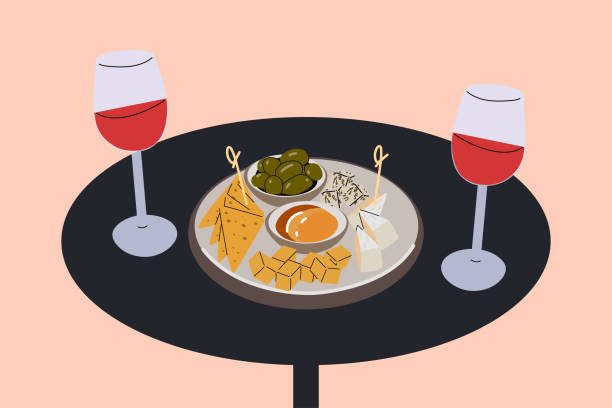 Table with two glasses of red wine and cheese plate Table with two glasses of red wine and cheese plate. Isolated flat vector illustration. cheese cutting board stock illustrations