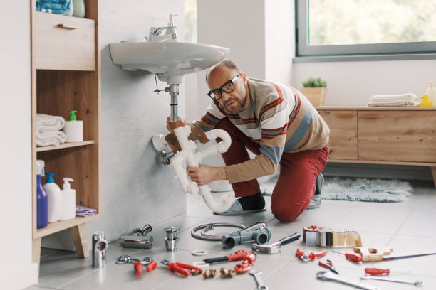 istock Man failing at DIY plumbing at home 2187991236