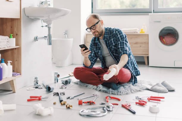 istock Confused man searching sink parts online 2187991442
