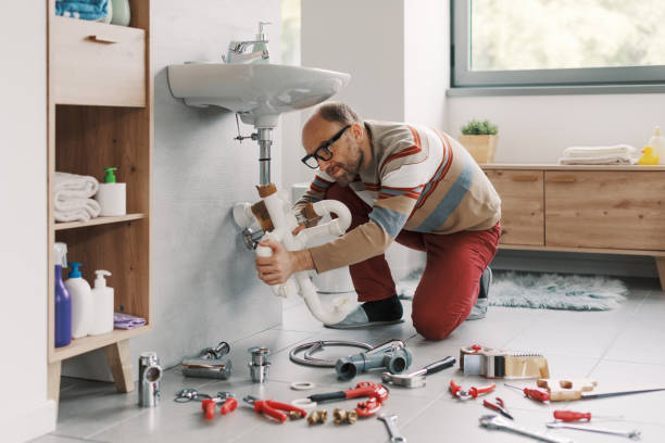 istock Man failing at DIY plumbing at home 2187991487