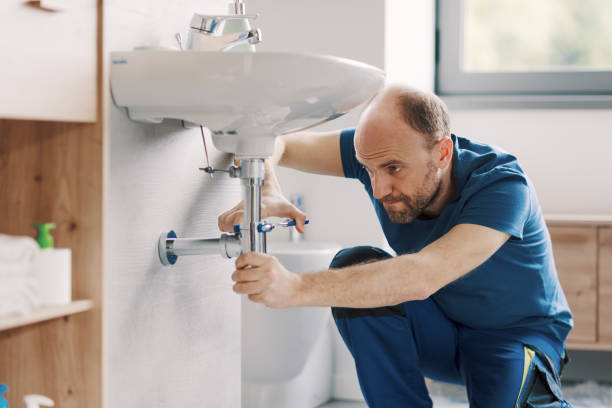 istock Expert plumber working on a bathroom sink drain 2187991808