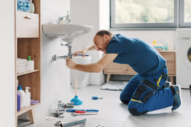 istock Angry plumber repairing a bathroom sink 2187991823