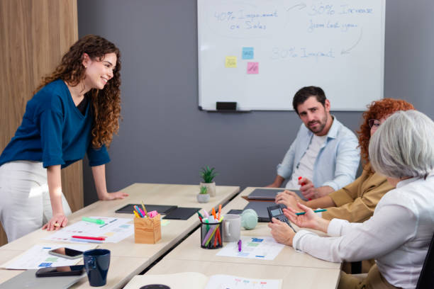 istock Business people collaborating on project in coworking space 2187992844