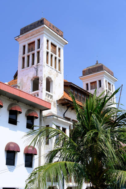 The twin towers of Cipta Niaga building, one of old buildings from Dutch era in Kali Besar area. The orginal name of the building is Internationale Credit en Handelsvereeniging Rotterdam. Kota Tua, Jakarta, Indonesia.