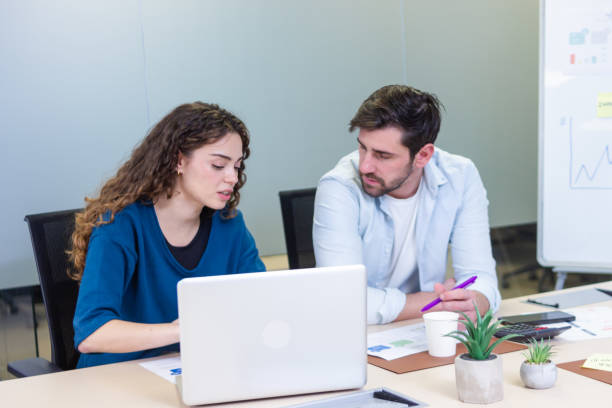 istock Business colleagues collaborating on a project in coworking space 2187993573