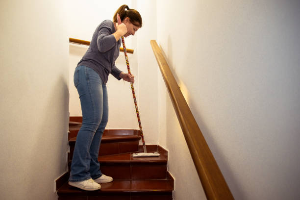 istock Woman cleaning with a mop 2187993747