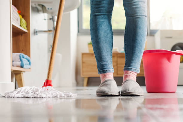 istock Housewife mopping the bathroom floor 2187995789