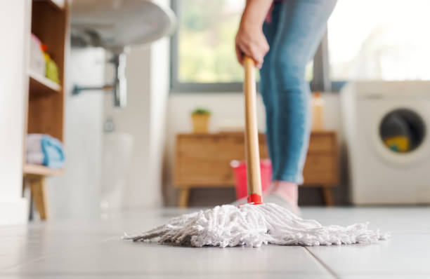 istock Housewife mopping the bathroom floor 2187995872
