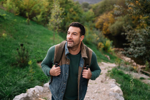 istock Young man's hiking the beautiful nature 2187996016