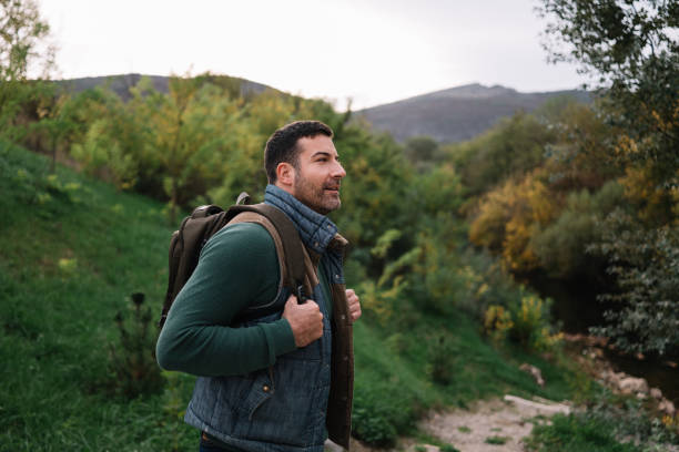 istock Young man's hiking the beautiful nature 2187996058
