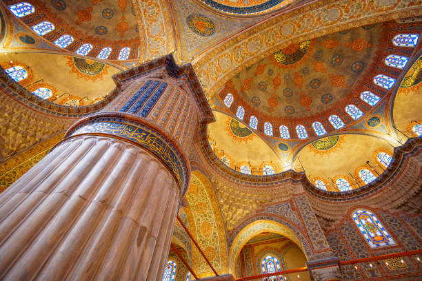 istock interior of mosque, ceiling, domes are painted with patterns, decorative windows and columns, chandeliers, beautiful architecture of Islamic religion, Istanbul, Turkey 2188002299