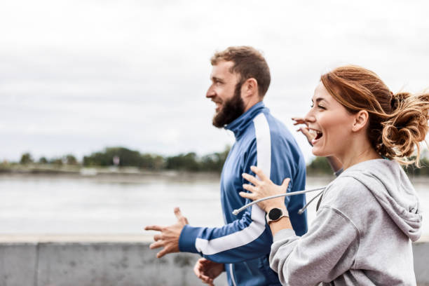 istock Couple Running Outdoors 2188002586