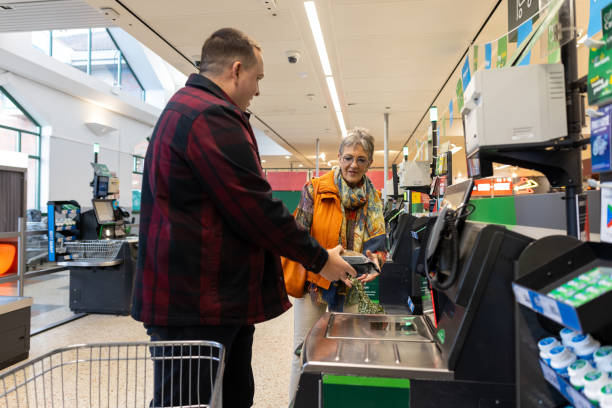 istock A Grandson’s Helping Hand at the Self Checkouts 2188003427
