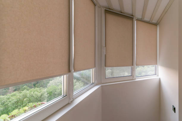istock Sunlight filtering through closed window shades in a balcony 2188007904