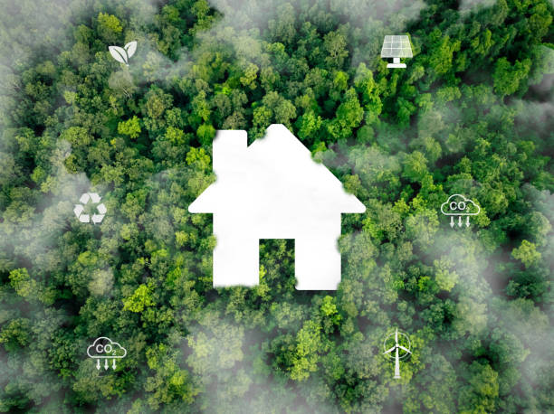 istock Sustainable home with renewable energy sources. Wind turbines and solar panels providing electricity for energy-efficient urban living and environmentally friendly green building designs. Reduce CO2. 2188012171
