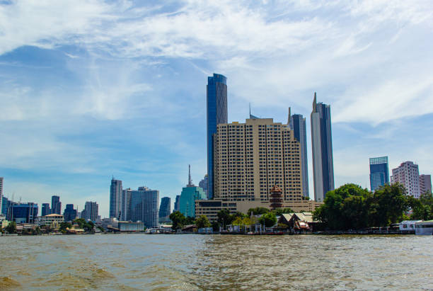 Bangkok cityscape view with Chao Phraya River and beautiful Blue sky