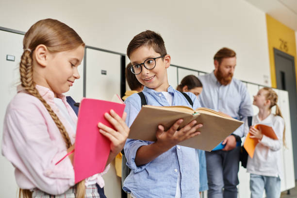 istock Engaging interaction among students and a teacher during a lively school activity 2188015987