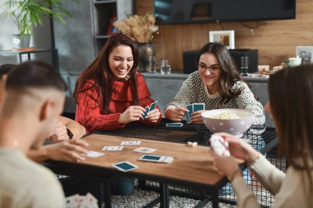 istock Joyful Group of Friends Bonding While Playing Card Games and Laughing 2188024310