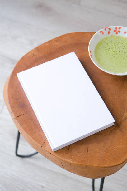 istock blank book mockup on coffee table with green matcha tea 2188025593