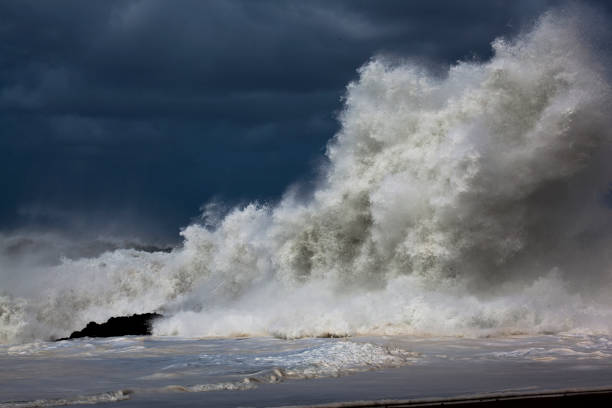 istock Massive Waves Crashing on Volcanic Rocks 2188027177