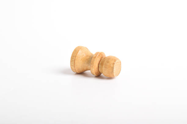 Wooden chess pawn isolated on white background