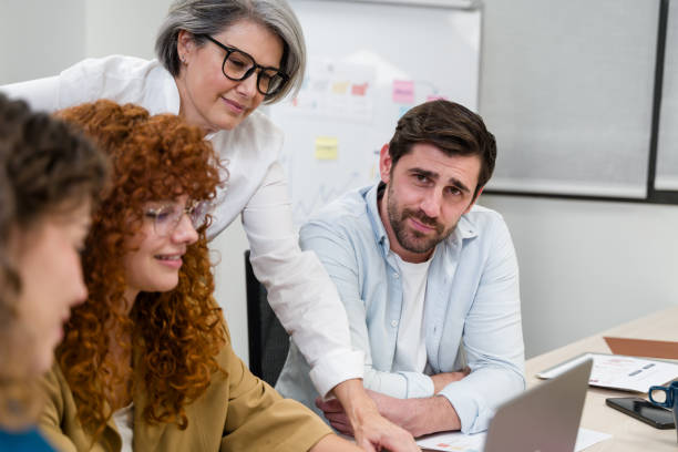 istock Business team working together on a project using laptop in the office 2188028951