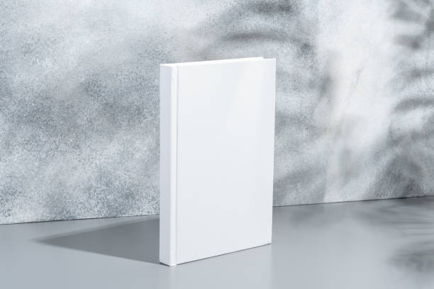 istock White blank book with hard cover on gray background with shadows 2188030134