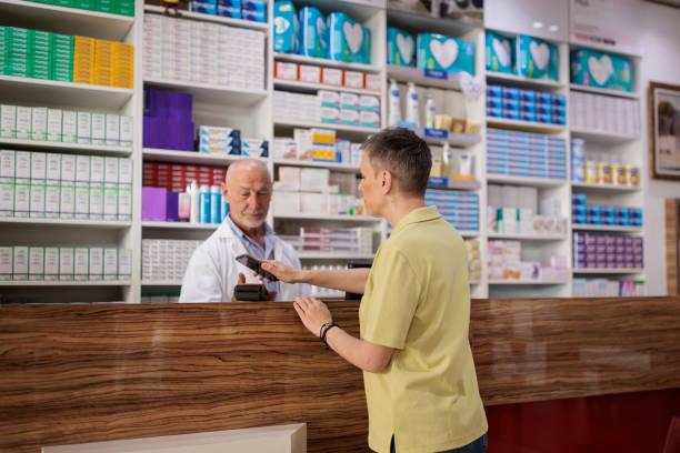 istock Customer paying for medicine at the pharmacy 2188030674