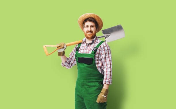 istock Happy farmer posing with a shovel 2188032897